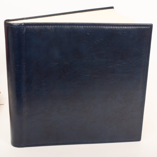 Album bound by hand, 36x36cm and 100 pages, ivory cardboard with rice paper, blue leather binding with seams-Hoper.gr